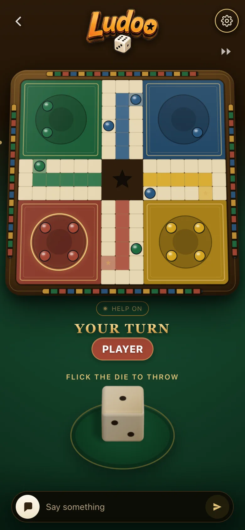 A Ludoo match in progress: pieces on the board, YOUR TURN, and the die resting on the felt.