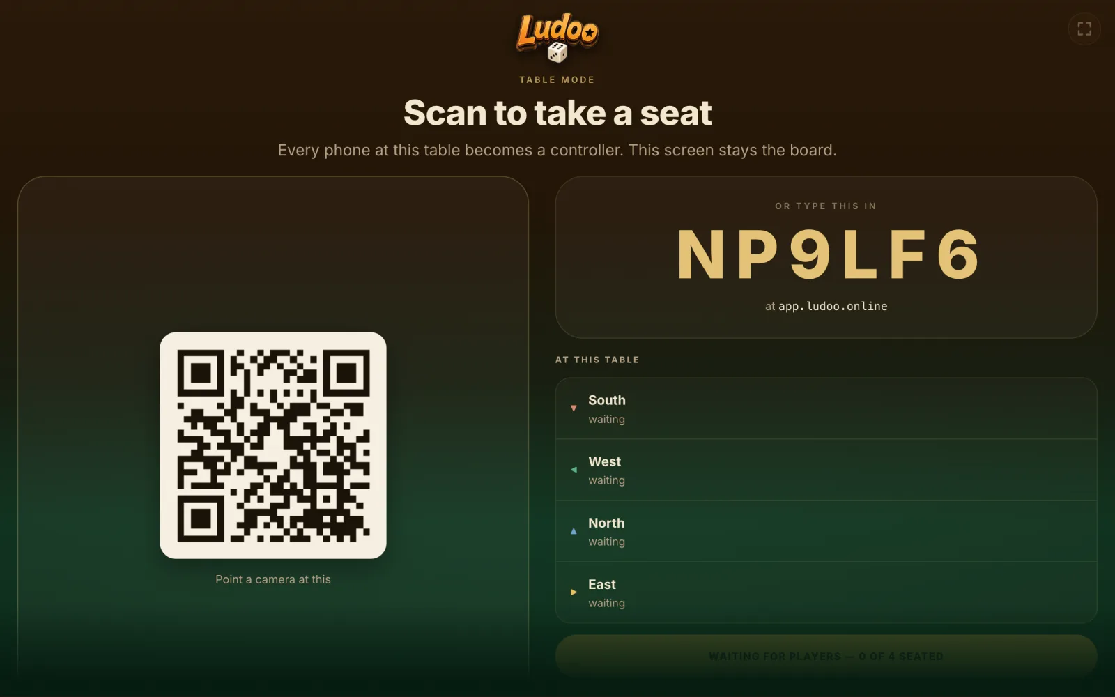 The shared screen: a QR code, a six-character join code, and the four seats.